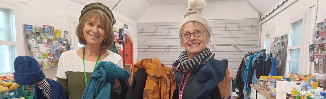 Winter Warmers - volunteers model winter clothing at Petersfield Free Shop