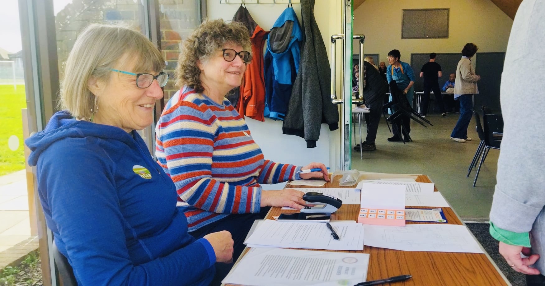 pecan representatives welcome visitors to the repair cafe